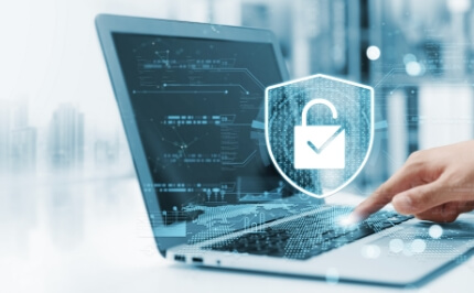 A view of managing digital security on a laptop computer, providing IT security solutions and managed security services (MSS) that are essential for DX promotion.